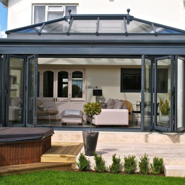 Aluminium Bifold Doors fitted into a conservatory