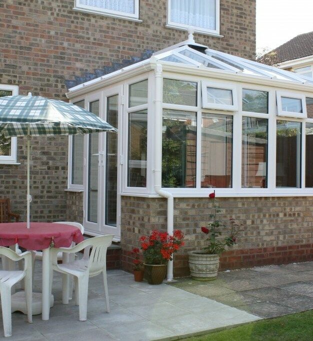 White-Edwardian-Conservatory-with-glass-roof-From-FcdHomeImprovements-co-uk.jpg